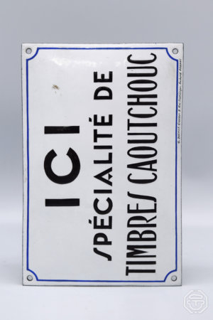 Plaque émaillée "Ici spécialité de timbres caoutchouc"